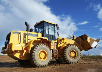 Custom Glass Solutions provides specialty laminated safety glass for construction and agriculture equipment