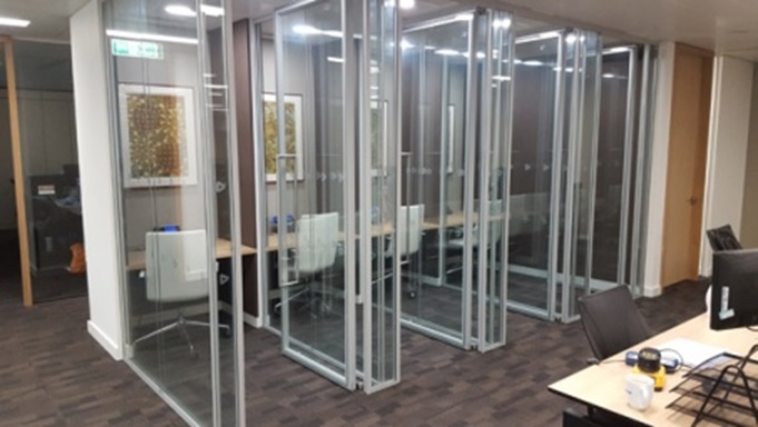 Custom Glass Solutions can design specialized MPS glass partitions for office, retail and hospitality scenarios that require special design considerations, to be used for social distancing glass barriers.